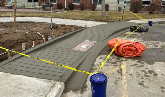 Concrete curbs and gutters